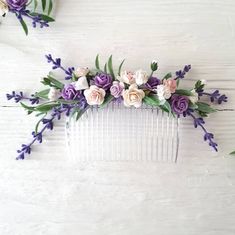 This Lavender flower hair comb, of artificial flowers of purple and leaves.  This a beautiful and delicate hair accessory for brides and a nice gift to the bridesmaids   On the wedding day, every bride wants to look fantastic. This delicate wedding purple hair comb, will be a magical addition to your look on your happiest day.  This will emphasize the ease of your image.  The comb is very conveniently attached to the hair and fits in with any hairstyle.  -Material- artificial flowers and artificial greenery  -Colors- lavender, lilac,purple, white, green - Size - 6,3 inches (16cm)(compositions) - Unique handmade.  Wedding - is one of the most important events in the life of any girl I am happy to try to make the most beautiful decoration for you, to make you feel the most beautiful bride. Y Purple Hair Accessories Wedding, White Hair Accessory, Floral Hair Accessories, Flower Hair Piece, Floral Hair Comb, Hair Piece Wedding, Flower Hair Pieces, Delicate Wedding, Floral Hair Combs