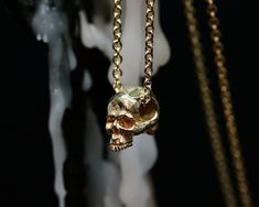 Chain with mini skull in 750 Gold (18 Kt.). Length cm. 50 The leather packaging is included in the price. The search for detail is dictated by the desire to differentiate itself from similar products on the market to make it precious and refined in the eyes of those who observe and wear it. All this requires a lot of work and patience but the result is extremely satisfying, as it will be impossible not to notice it. Included in the price of the jewel is the genuine leather packaging/card holder Yellow Gold Skull Jewelry For Gift, Luxury Skull Shaped Jewelry For Gift, Gold Skull-shaped Engraved Jewelry, Luxury Skull Jewelry For Gifts, Luxury Engraved Skull Jewelry, Gold Skull Necklace, Leather Packaging, Packaging Card, Gold Skull