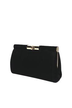 This black clutch bag is crafted of vintage-inspired velvet and features a detachable gold chain shoulder strap. Interior slip pocket Detachable shoulder strap Rayon, silk Structured top with turn-lock closure Interior, one slip pocket Approx. 6"H x 9"W x 2"D Made in Italy Black Clutch Bag, Black Clutch Bags, Structured Top, Velvet Clutch, Black Clutch, Black Velvet, Gold Chain, Gold Chains, Clutch Bag