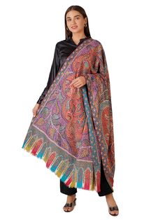 Experience the ultimate in luxury with our Pashmina Shawl, adorned with exquisite hand Sozni embroidery designs in a vibrant array of colors. Crafted from the finest Kashmiri pashmina, this shawl combines traditional artistry with contemporary elegance. Product Details: Material: Pure Pashmina (100% Cashmere) Size: 100 cm X 203 cm / 40 Inch X 80 Inch / 1.1 x 2.2 Yards (Approx) Base Color: Multi Color Base Colors Embroidery: Multi-color Sozni embroidery designs Origin: Handcrafted in Kashmir by s Traditional Pashmina Shawl With Pallu, Bohemian Jamawar Pashmina Shawl With Intricate Embroidery, Bohemian Pashmina Shawl With Multicolor Resham Embroidery, Bohemian Style Multicolor Pashmina Shawl, Elegant Pashmina Shawl With Multicolor Embroidery, Transitional Multicolor Embroidered Jamawar Traditional Wear, Elegant Multicolor Embroidered Pashmina Shawl For Festive Occasions, Elegant Embroidered Multicolor Traditional Wear, Bohemian Multicolor Embroidered Pashmina Shawl With Traditional Patterns