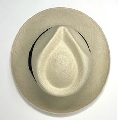 The quintessential Panama hat is the epitome of style and elegance. Long time ago this Masterpiece was a men’s hat now its for anyone that wants to look in style. El Galpon's tribute to the Spanish Caribbean & Puerto Rican Hat tradition. Handmade in Ecuador, designed in Puerto Rico. Super Fine Panama hat Grade 11/12 Labor Time 35 days Leaves per square inch 23-24 --- El sombrero de Panamá por excelencia es el epitome de estilo y elegancia. Hace mucho tiempo, esta Obra Maestra era un sombrero de Puerto Rican, Long Time Ago, Panama Hat, Puerto Rico, Panama, Hats