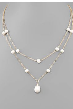 Indulge in the timeless elegance of our Pearl Layered Necklace. Handcrafted with delicate freshwater pearls and a sturdy metal chain, this necklace exudes sophistication. The lobster clasp ensures a secure fit, while the 16" length adds a touch of refinement to any ensemble. Elevate your style with this luxurious accessory. Pearl Layered Necklace, Layered Pearl Necklace, The Lobster, Trendy Handbags, Jade Beads, Layered Necklace, Elevate Your Style, Metal Chain, Layered Necklaces