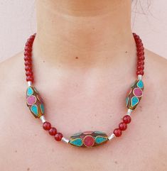 This necklace was made with carnelian beads, Tibetan silver spacers and three Indian pendants made with turquoise paste and coral paste. The closure is a magnet. Carnelian has always been considered the symbol of life, much appreciated by the ancient Romans. It gives joie de vivre, optimism, vitality, courage and strength; it also counteracts negative feelings such as hatred, envy and jealousy. This necklace is made of carnelian beads, Tibetan silver spacers and three Indian charms made of turqu Symbol Of Life, Negative Feelings, Carnelian Necklace, Turquoise Boho, Life Symbol, Carnelian Beads, Les Sentiments, Ancient Romans, Charm Necklace