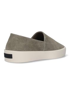 Fear Of God espadrilles sneakers in grey suede with slip-on fit, logo label detail on the back, white rubber sole. Composition: 100% Leather Casual Leather Slip-ons For Streetwear, Modern Slip-on Sneakers With Contrast Sole For Spring, Casual Everyday Slip-ons With Stitched Sole, Sporty Suede Slip-on Sneakers With Rubber Sole, Modern Suede Slip-on Sneakers, Casual Gray Slip-on Sneakers For Summer, Modern Low-top Slip-ons, Gray Slip-ons With Rubber Sole For Summer, Low-top Suede Slip-on Sneakers With Contrast Sole