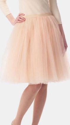 This Gorgeous and Feminine Tulle skirt can be made in ANY color, ANY length, and any size. This beautiful skirt is the ideal Bridesmaid Dress or Wedding Skirt and is lined with a soft satin fabric of the same or contrasting color as the tulle. ALL ITEMS HANDMADE BY ME IN USA The satin waistband is flat with zipper and hook/eye closure in back. Elastic can be added to the back of the waistband, however only allows for a little wiggle room. These custom tutu skirts are perfect for any occasion and Elegant Pink Prom Skirt, Tulle Dress For Debutante Ball With Full Skirt, Elegant Tulle Dress For Bridal Shower, Full Tulle Skirt Dress For Debutante Ball, Elegant Tulle Fabric For Bridesmaid And Prom, Bridesmaid Dress With Full Skirt For Prom Season, Formal Tulle Dress With Flowy Skirt, Spring Wedding Bridesmaid Dress, Knee-length, Elegant Dress With Lined Tulle Skirt