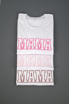 Professionally embroidered MAMA tees These are WHITE shirts with HOT PINK, LIGHT PINK, AND ROSE GOLD  Choose which color combination you would like from the drop down These are embroidered on comfort colors shirts UNISEX FIT  SHORT SLEEVE 100% RINGSPUN COTTON Want a different color? Checkout our shop for other color options!  Want a different word? Just message us & we will let you know if we can! Family Matching White T-shirt With Embroidered Text, White Family Matching T-shirt With Embroidered Text, White Tops With Embroidered Graphics For Mother's Day, White Embroidered T-shirt For Family Matching, Embroidered White Tops For Mother's Day, White Embroidered Tops For Mother's Day, Mother's Day Crew Neck Top With Embroidered Text, Mother's Day Cotton T-shirt With Embroidered Graphics, Mother's Day Embroidered Text Crew Neck Top