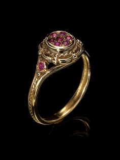 Unique victorian antique style 14K ring with 9 small canter ruby stones. Vintage ring. Top width : 1cm. *14K Solid Gold, we don't offer any plated or gold filled jewellery at all. Free Shipping for all orders . I offer a lifetime craftsmanship warranty on all of my jewellery. I resize all rings for life free of charge. Antique Ruby Ring Vintage, Antique Ruby Ring With Rose Cut Diamonds, 14k Yellow Gold Ruby Ring With Intricate Design, Victorian Ruby Ring In Yellow Gold With Intricate Design, Victorian Yellow Gold Ruby Ring With Intricate Design, Antique Ruby Ring With Rose Cut Diamonds For Anniversary, Victorian Gold Diamond Ring With Ruby, Yellow Gold Ruby Ring With Intricate Design For Promise, Victorian Ruby Ring With Center Stone