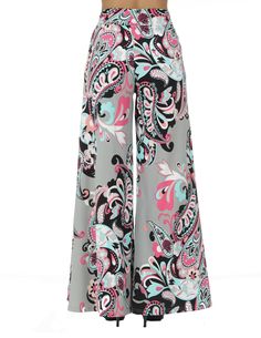 Mid-waist pull-on Palazzo Pants with floral design. The model is wearing a size small. Material: 80% Nylon 20% Spandex Patterned Pants With Elastic Waistband For Spring, Chic Patterned Bottoms For Summer, Patterned Bottoms For Spring, Chic Patterned Summer Bottoms, Spring Floral Print Patterned Bottoms, Chic Patterned Bottoms With Floral Print, Spring Patterned Wide Leg Printed Pants, Multicolor High-waisted Wide Leg Pants With Floral Print, Chic Floral Print Patterned Bottoms