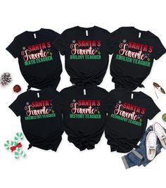 Show your appreciation for the teachers who make a difference every day with our "Santa's Favorite" teacher Christmas shirts! Perfect for all teachers, these festive tees feature a cheerful holiday design with snowflakes, holly, and bold, eye-catching text. Whether you're a teacher looking to spread some holiday cheer in the classroom or searching for a thoughtful gift for a favorite educator, this shirt is a perfect choice. Made from soft, comfortable fabric, it's ideal for wearing during school holiday parties, Christmas events, or cozying up by the fire during winter break. Celebrate the season and the special teachers in your life with a shirt that's as merry and bright as they are! Soft & Comfortable: Made with 100% Airlume combed and ring-spun cotton, providing a lightweight, breatha Christmas Shirts For Teachers, Teacher Christmas Shirts, Christmas Teacher Gift, School Holiday Party, Shirts For Teachers, Teacher Holiday Gifts, Semi Formal Wear, Christmas Events, Favorite Teacher