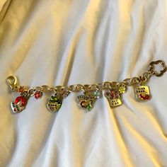 Never Worn. Excellent Condition. Very Colorful. Make Me An Offer! Contact Me With Any Questions. Grandma Basket Gift, Grandma Basket, Tooth Gems, Tooth Gem, Basket Gift, Jewelry Accessories Ideas, Bracelet Charms, Accessories Ideas, Bracelet Ideas