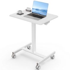 a laptop computer sitting on top of a white stand up desk with wheels and casters