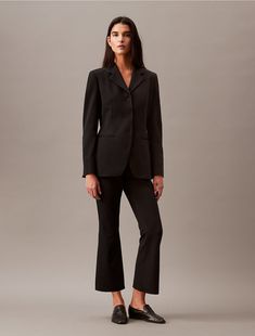 Designed with structured shaping, this polished blazer is a workwear essential. Crafted from fine stretch crepe with 3-button closures at front, side besom pockets and contoured seaming accents.  Material: 95% Polyester, 5% Elastane. Workwear Essentials, Stretch Crepe, Fitted Blazer, Outerwear Women, Work Wear, Calvin Klein, Blazer, Clothes, Black