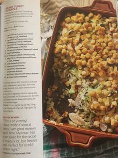 the recipe book is open to show an image of a casserole dish with stuffing