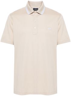 sand beige cotton piqué weave ribbed polo collar with striped border short sleeves logo patch at the chest short side slits straight hem logo-debossed buttons short front button fastening Cream Cotton Polo Shirt With Ribbed Collar, Cream Cotton Polo Shirt, Classic Cream Polo Shirt With Collared Neckline, Classic Beige Polo Shirt, Classic Beige Polo Shirt With Collared Neckline, Classic Beige Polo Shirt For Summer, Classic Beige Collared Polo Shirt, Classic Beige Summer Polo Shirt, Classic Beige Polo Shirt With Ribbed Collar