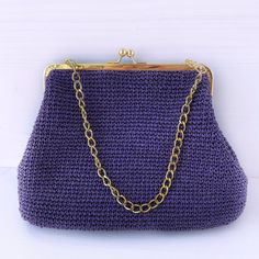 Crochet raffia clutch bag makes special accent, adds an effect zest to outfit. Large kiss lock handbag with metal clasp can keep a lot of little things that no woman can do without.  It`s for all seasons and special day / evening like wedding, bridal party, cocktail, date etc..  Great gift for any occasion and for women any age more crochet bag here https://etsy.me/3mXZ93a Violet clutch purse size: 16``x12`` (40x30 cm)  polyester lining Custom orders are welcome! This crochet clutch is lightweight, strong, hypo-allergenic, does not gather dust or dirt, does not wrinkle, easy to wash. CARE: hand washable in cold water 30 C. Dry flat. Do not ironing Purple vintage style Kiss lock bag produced in non-smoking, pet free studio. Real item color can be a bit different from photo because of screen Outfit Large, Raffia Clutch, Crochet Beach Bags, Crochet Clutch, Raffia Bag, Wedding Bridal Party, Chunky Yarn, Beach Tote Bags, Crochet Handbags