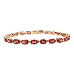 This is part of Chairish’s Fine Jewelry assortment.  This Garnet Tennis Bracelet in 14K gold showcases 24 endlessly sparkling natural garnet, weighing 13.26 carats. It measures 7 inches long in length.  Garnet gemstone restores balance. Designed with perfect oval cut garnet set after each garnet to make you stand out on any occasion or event. The elegant style complements the attire beautifully and is a Sisters Gift, Bridal Shower Gift, Fine Jewelry Gift, Gift For Sister, Mother Daughter Gift, B Elegant Faceted Ruby Gemstones, Elegant Garnet Gemstone Bracelets, Elegant Garnet Gemstone Bracelet, Formal Garnet Gemstone Bracelets, Elegant Garnet Bracelets For Formal Occasions, Mother Daughter Gifts, Gift For Sister, Garnet Gemstone, Fine Jewelry Gift