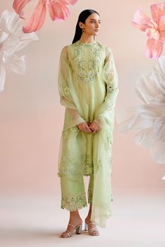 Mint green chanderi kurta with floral cutwork hem and threads and beads embroidery. Paired with coordinating cutwork pant. - Aza Fashions Green Tissue Silk Sets With Floral Embroidery, Green Floral Embroidered Tissue Silk Sets, Green Floral Embroidery Tissue Silk Sets, Green Organza Sharara With Floral Embroidery, Spring Green Sharara With Sheer Dupatta, Semi-stitched Green Palazzo Set With Floral Embroidery, Green Organza Lawn Suit For Festivals, Green Organza Lawn Suit For Diwali, Green Floral Embroidered Tissue Silk Dupatta