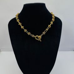 This chain necklace is smashing. Can be worn daily with any kind of outfit. #roughnecklace #barbwiredesigners #lovenecklace #streetnecklace #celebritynecklace #barbwirenecklace Chunky Chain Lariat Necklace As Gift, Chunky Chain Lariat Necklace For Gift, Chunky Chain Metal Necklaces For Jewelry Making, Gold Metal Lariat Necklace With Lobster Clasp, Metal Toggle Necklace With Gold Link Chain, Metal Lariat Necklace With Toggle Clasp, Trendy Toggle Clasp Chain Link Necklace, Gold Chain Link Toggle Necklace, Trendy Chain Link Toggle Necklace As Gift