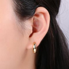 DESCRIPTION: Modern hoops that showcase a minimalistic and chic huggie style design. Lightweight and comfortable, these 18K Gold Plated Dome Huggie Hoops are sure to be your go to everyday earrings. Measurement: 0.8 inches MATERIAL: 18K Gold Plated over Stainless Steel. Hypoallergenic, Tarnish Free and Water Resistant. Mix and match with any of our 18K Gold Necklaces and Anklets to create the most unique and customized look! All orders are shipped out within 1 business day. PoshForKeeps is proud Minimalist Earring, Luxe Jewelry, 18k Gold Necklace, Link Earrings, Gold Filled Earrings, Cz Earrings, Earring Jewelry, Everyday Earrings, Gold Earrings Dangle