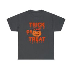 Get ready to be the life of the party with our Halloween t-shirt! Our exclusive design of pumpkins and a terrifying but fun Trick or Treat writing. Wearing this t-shirt on Halloween will make you stand out at any Halloween celebration. Plus, our premium heavy cotton unisex T-shirt is comfortable and durable, meaning you'll be able to wear it over and over again. Don't worry about fashion, this t-shirt is always in style! Casual fashion is the trend of the season and our t-shirt is perfect for an Funny Halloween T-shirt For Streetwear, Funny Halloween Streetwear T-shirt, Halloween Novelty T-shirt For Streetwear, Halloween Funny Print Orange T-shirt, Novelty Halloween T-shirt For Streetwear, Orange Halloween T-shirt With Funny Print, Halloween Orange Graphic Print T-shirt, Orange Funny Print T-shirt For Halloween, Orange Halloween Graphic T-shirt