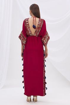 Buy Maroon Munga Silk Embroidery V Neck Kaftan For Women by Surily G Online at Aza Fashions. Festival Floor-length Maxi Dress With Tassels, Bollywood Style Embellished Maxi Dress For Festive Occasions, Long Festive Dress With Tassels, Festive Long Dress With Tassels, Long Festive Dresses With Tassels, Bohemian Floor-length Dress With Side Slits, Traditional Kimono With Tassels, Bollywood Style Party Kaftan Maxi Length, Traditional Floor-length Tassel Dresses