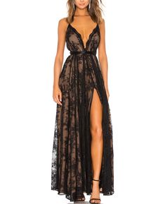 PRICES MAY VARY. Fabric: 95% Polyester+5% Spandex. This maxi dress showcases a beautiful black lace overlay, delivering a romantic and delicate allure. Benefit: Women black evening gown, elegant chic style, the high split design highlights your perfect body curve and makes you look sexier, while allowing for unrestrained movement as you glide through your event. Features: Spaghetti straps maxi dress, onvertible shouldernstraps with back tie closure. The cross-back strap design adds an unexpected Paris Gown, Black Evening Gown, Michael Costello, Spaghetti Strap Maxi Dress, Split Maxi Dress, Elegant Chic, Revolve Clothing, Guest Dresses, Fitted Dress