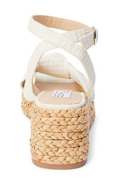 A knotted vamp accent brings modern dimension to a boho-cool sandal lifted by a raffia-wrapped platform and integrated wedge heel. 3" heel; 1" platform Adjustable ankle strap with buckle closure Cushioned footbed with arch support Synthetic upper, lining and sole Imported Trending Flats, Ankle Shoes, Espadrille Sandals, Platform Wedge Sandals, Boot Accessories, Platform Wedge, Girls Boots, Sneaker Collection, Girls Bags