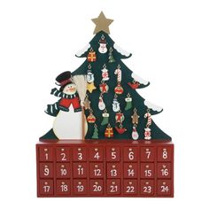 a wooden calendar with a christmas tree on it