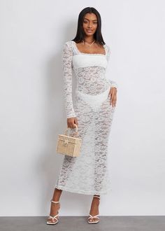 Enhance your feminine charm with our Square Collar Long Sleeved Floral Lace Maxi Dress. The elegant square collar and delicate floral lace add a touch of sophistication to any occasion. Made of breathable, high-quality fabric, this dress is perfect for any stylish lady. Don't miss out! Fabric: Slight Stretch Material: Polyester Fiber *Underwear not included Fitted Lace Dress With Lace Trim For Brunch, Fitted Dresses With Lace Sleeves And Square Neck, White Dress With Lace Sleeves And Square Neck, Fitted Lace Patchwork Dress For Brunch, Chic Square Neck Dress With Lace Trim, Chic Lace Dress For Garden Party, Chic Square Neck Dress With Lace Sleeves, Chic Dress With Lace Sleeves And Square Neck, Chic Fitted Lace Dress With Delicate Lace