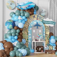 an airplane themed birthday party with balloons and decorations