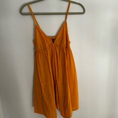 Nwot Wild Fable Baby Doll Mini Dress In Dark Yellow Color. Size M, Never Work Perfect Condition. Perfect Summer Dress Cotton V-neck Sundress For Daywear, Cotton V-neck Mini Dress For Brunch, Cotton Mini Dress With V-neck For Brunch, V-neck Cotton Mini Dress For Vacation, Yellow V-neck Sundress For Summer, Summer V-neck Sundress For Daywear, Yellow Cotton Mini Dress For Vacation, Orange Sleeveless Cotton Mini Dress, Yellow Cotton Mini Dress For Beach