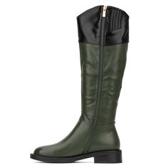 The two-toned Desiree boot is the perfect travel buddy. These easy to wear boots features a curved collar, round toe, belt accent and inner zipper. Green Knee-high Heeled Boots For Fall, Green Boots For Outdoor Wear In Fall, Green Boots For Outdoor Use In Fall, Green Leather Winter Boots, Green Boots For Outdoor Activities In Fall, Green Winter Boots With Round Toe, Green Ankle Boots For Winter, Green Leather Waterproof Boots For Winter, Olive Round Toe Boots For Fall