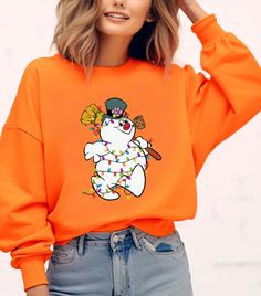 Funny Snowman Xmas Light Sweatshirt, Snowman Winter Sweatshirt, Snowman Holiday Sweatshirt, Trendy Christmas, Christmas Gift Sweatshirt IMPORTANT:  Please Review Before Placing Your Order  Ordering Process 1- Choose your desired options from the dropdown.     Please, Check and Review all Photos.     Select Your T-shirt Color.     Select Your T-shirt Size. 2- Add to cart and finalize your purchase. 3- Ensure you include any personalization details. - Points to Note - -The design is made of DTF (Direct-to-Film) print. -All of our sizes are unisex sizing which you can refer to the size chart for the exact measurements. Sizes may differ for different brands. -Please do not hesitate to contact us regarding questions about the items (sizes, shirt colors, design font colors, etc.) -We ONLY use th Funny Snowman, Sweatshirt Trendy, Xmas Lights, Film Prints, Holiday Sweatshirt, Winter Sweatshirt, Toddler Sizes, Christmas Christmas, Shirt Color