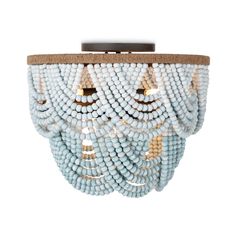 a blue and white beaded chandelier hanging from a wooden ceiling light fixture