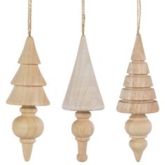 three wooden christmas trees hanging from strings