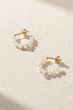 Mizuki never runs out of fresh, new ways to incorporate pearls into its pieces. These hoop earrings are cast from 14-karat gold and strung with lustrous Akoya ones and a single diamond, giving them the perfect amount of sparkle. Pearl Huggie Jewelry For Anniversary, Pearl Huggie Earrings For Anniversary, 14k Gold Hoop Pearl Drop Earrings, Yellow Gold Pearl Huggie Earrings, Delicate Yellow Gold Hoop Pearl Earrings, 14k Gold Hoop Earrings With Pearl Drop For Weddings, Small Hoop Pearl Earrings In Yellow Gold, Yellow Gold Pearl Small Hoop Earrings, Small Hoop Pearl Earrings With Charm For Anniversary