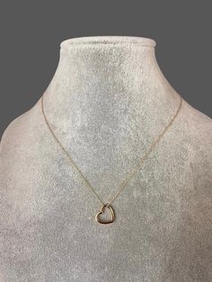 "A sweet and elegant floating 14k gold vermeil heart charm is simply suspended from a 14k gold filled chain.  Choose from a 1mm gold chain with a gold spring ring clasp, or a 1.5mm gold chain with a gold lobster clasp. Each chain measures 16\" with an extension to 18\".  Please send a message if a different length chain is desired. A wonderful gift for a bride, bridesmaid, best friend, or anniversary! Floating heart charm: 13x13mm  Total length of charm: 1/2\" Gold chain: 1mm or 1.5mm This neckl Elegant 14k Gold Filled Heart Necklace, Rose Gold Charm Necklace With Heart Pendant, Rose Gold Heart Pendant Charm Necklace With Delicate Chain, 14k Gold-filled Heart Necklace With Heart Charm, 14k Gold Heart Necklace Tarnish Resistant For Gift, 14k Gold Tarnish-resistant Heart Necklace Gift, 14k Gold Heart Necklace With Delicate Chain For Gift, 14k Rose Gold Necklace With Heart Charm, Dainty 14k Gold Open Heart Necklace