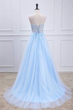 a light blue prom dress on a mannequin