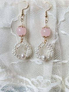 Sold as a pair. complete with pink crystal , real pearl and Abs resin. Please note they are made with natural pearl , they won't be perfect, and each earring is different, though we do try to match them. R E T U R N   P O L I C Y  No return for earrings due to hygiene reason. Cheap Pink Pearl Earrings As Gift, Cheap Pink Pearl Earrings For Gift, Feminine Jewelry For Bridesmaid Gift, Feminine Pearl Charm Jewelry For Party, Handmade Delicate Pearl Earrings, Feminine Pink Pearl Drop Earrings, Handmade Pearl White Pearl Earrings, Feminine Party Jewelry With Pearl Charm, Rose Gold Jewelry With Pearl Drop