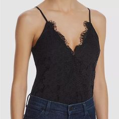 Beautiful Black Lace Details! Crossover V-Neck With Snap Closure Adjustable Spaghetti Straps Cheeky Coverage, Snap Gusset Lace Design, Lined Bodice Self: 55% Cotton/45% Nylon; Contrast: 100% Polyester; Lining: 96% Polyester/4% Spandex Chic V-neck Top With Lined Body, Fitted V-neck Lined Camisole, Elegant Spring Camisole Bodysuit, Party Bodysuit With Built-in Bra And V-neck, Flirty Fitted V-neck Camisole, Elegant Cami Bodysuit For Party, Fitted V-neck Flirty Camisole, Chic Party Bodysuit With Camisole Design, Spring Camisole Bodysuit For Night Out