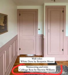 two pink doors in a white room with wood flooring and rugs on the floor