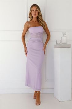 Length from bust to hem of size S: 123cm. Chest 33cm, Waist 29cm, across front only of size S. Maxi dress. Semi-lined. Model is a standard XS and is wearing size XS. True to size. Stretch. Mesh. Cut-out to the waist. Sheer bodice. Zipper, hook eye closure. Cold hand wash only. Polyester/Spandex. If you're searching for a statement dress, you've found it. The Contemporary Chic Mesh Maxi Dress features a cut-out to the waist and a sheer mesh bodice. Style with heels and curls for all the likes. Formal Wedding Guest Dress, Dress Lilac, Contemporary Dresses, Mesh Maxi Dress, Guest Attire, Statement Dress, Contemporary Chic, Lilac Dress, Pink Mini Dresses