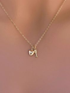 14k solid gold Angle wing , paw print & heart  necklace. The best gift for Pet lover necklace. All components onto 14k solid gold. it consists of .. -14k Solid Gold 9.7x3.9mm intinity link, and  -14k Solid Gold 6mm puffed Heart Pendant attach onto  -14k Solid yellow gold baby Box chain or Cable chain or Rope chain , -Come up with beautiful jewelry gift box and -One set of Care instruction package .  MORE Solid GOLD JEWELRY https://www.etsy.com/shop/rainbowearring1/items?section_id=22350831 MORE Heart Charm Jewelry For Best Friend Gift, Double Heart Charm Jewelry For Best Friend, Heart Charm Double Heart Jewelry For Best Friend, Heart Pendant Charm Necklace For Best Friend Gift, Heart Pendant Jewelry Charms For Best Friend Gift, Heart Pendant Jewelry For Best Friend Gift, Heart Shaped Charm Necklace For Best Friend, 14k Gold Pendant Charm Necklace For Valentine's Day, 14k Stamped Double Heart Jewelry For Valentine's Day