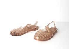 Vintage Jelly sandal shoes Size 8 listed Interior sole length - 10 inches Width at widest - 3.5 inches Heel - 1/2 inch Good condition!   sh99 Vintage Flat Sandals For Summer, Vintage Closed Toe Beach Sandals, Vintage Closed Toe Sandals For Beach, Vintage Gold Sandals With Round Toe, Gold Vintage Sandals With Round Toe, Vintage Slip, Vintage Slips, Sandal Shoes, Jelly Sandals