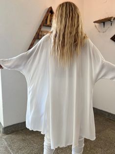 Gorgeous free-flow loose rayon/cotton top for intentional gatherings and practices 🤍 This oversized shirt can be worn as a Ceremony or Kundalini white piece as well as a part of a nomadic festival outfit. Designed by our Moroccan friends from LA this piece truly resembles the nomad lifestyle. We fell in love with its comfy feel and are honored to add it to our “Ceremony White” collection of pieces created with intention to support you on your journeys Within and connecting to the Higher Self. T Nomad Lifestyle, Small Boutique, Pant Sets, Loose Outfit, We Fall In Love, Cotton Top, Fell In Love, Dance Outfits, Festival Outfit