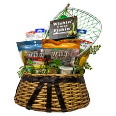 a basket filled with food and snacks sitting on top of a table