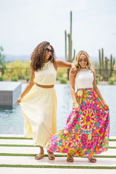 Sunshine feels in our Dressed In Yellow Set. This woven cotton set features a midi skirt and sleeveless crop top. Pair with sandals and sunglasses. • Midi Length• Front Pockets• Elastic Waist• Lined• Woven Cotton• Sleeveless• Crop Top• Round Neckline• 100% Cotton Multicolor Maxi Skirt For Summer Vacation, Spring Beach Maxi Skirt, Beach Maxi Skirt For Spring, Trendy Summer Maxi Dress For Day Out, Maxi Length Beach Skirt For Spring, Spring Crop Top For Day Out, Chic Summer Maxi Skirt For Day Out, Trendy Cotton Summer Skirt, Summer Style Maxi Skirt For Day Out