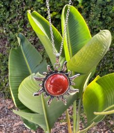 Red Jasper Sun Pendant Genuine Red Jasper Necklace Man Made Encased Crystal Due to its truly extraordinary metaphysical properties, red jasper stones are believed to be a one-stop-shop for manifesting courage, strength, and wisdom. In the same way that a beautifully rendered landscape echoes our complex, vast ecosystem, these unique gemstones remind us to consider the priceless planetary elements that give us life. The combination of minerals that give red jaspers stones their opaqueness and dee Red Jasper Necklace, Necklace Man, Red Jasper Stone, Sun Pendant, Jasper Necklace, Jasper Stone, Unique Gemstones, Red Jasper, Deep Colors