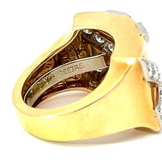 This stunning estate X ring from David Webb is crafted from 18k yellow gold, platinum and diamonds. The signature of the renowned designer is embossed for authenticity. Wearing this luxurious design is a testament to exquisite taste and craftsmanship. Jewelry Style : RingMetal Type : 18K Yellow Gold and PlatinumDiamonds : 20 round, approximately 0.97 ctwColor : G-H Clarity VS2-SI1Approximate Weight : 14.15 gramsRing Size : 5.75 with butterfly sizer in shank to keep ring in placeDavid Webb estate Luxury Estate Ring For Gift, X Ring, David Webb, Jewelry Style, Luxurious Design, Gold Platinum, Modern Jewelry, Estate Jewelry, Jewelry Shop