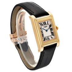 Cartier Tank a Vis Privee CPCP Collection Yellow Gold Mens Watch W1529451 Box Papers. Manual winding movement. 18k yellow gold case 27.0 x 30.0 mm. Octagonal crown set with faceted blue sapphire. . Scratch resistant sapphire crystal. Silvered guilloche dial with black Roman numerals. Sword-shaped blued steel hands. Secret Cartier signature at VII. Black leather strap with Cartier 18k yellow gold deployant clasp. Cartier Santos Watch, Cartier Calibre, Cartier Ballon Bleu, Cartier Santos, Gold Watch Men, Cartier Tank, Gold Case, Rolex Datejust, Swiss Watches